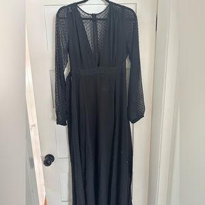 Black floor-length v-neck dress with slits